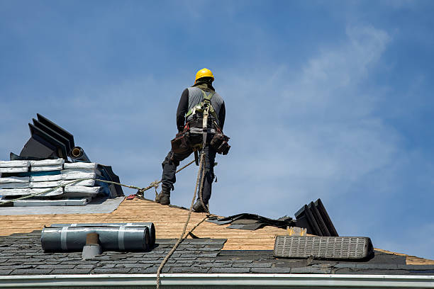 Professional Gutter Installation technician working in Pound Ridge, NY